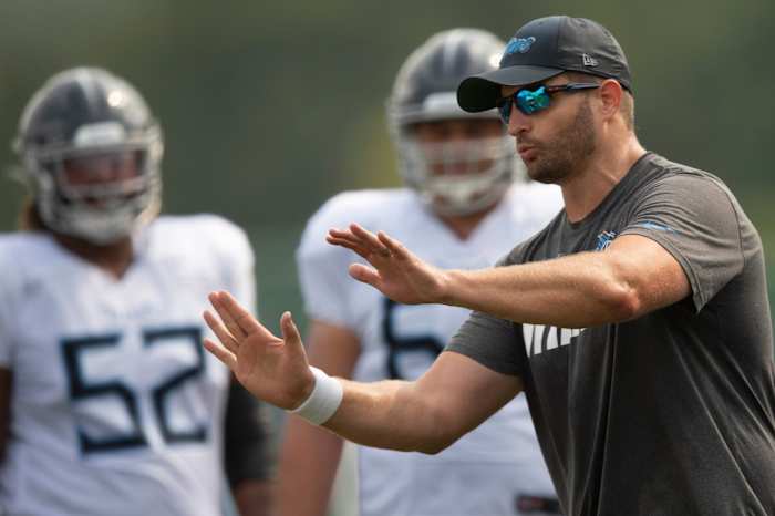 Tennessee Titans offensive line coach Keith Carter gives instruction to his players during a training camp practice at Saint Thomas Sports Park Friday, Aug. 6, 2021 in Nashville, Tenn.